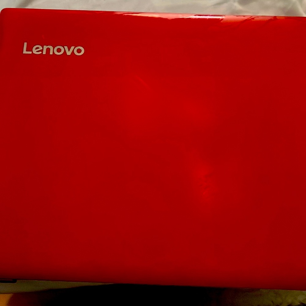 Lenovo computer still works perfectly comes with the charger and a computer bag